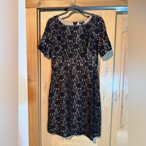 New without tags. Allen B size 6 black lace dress.